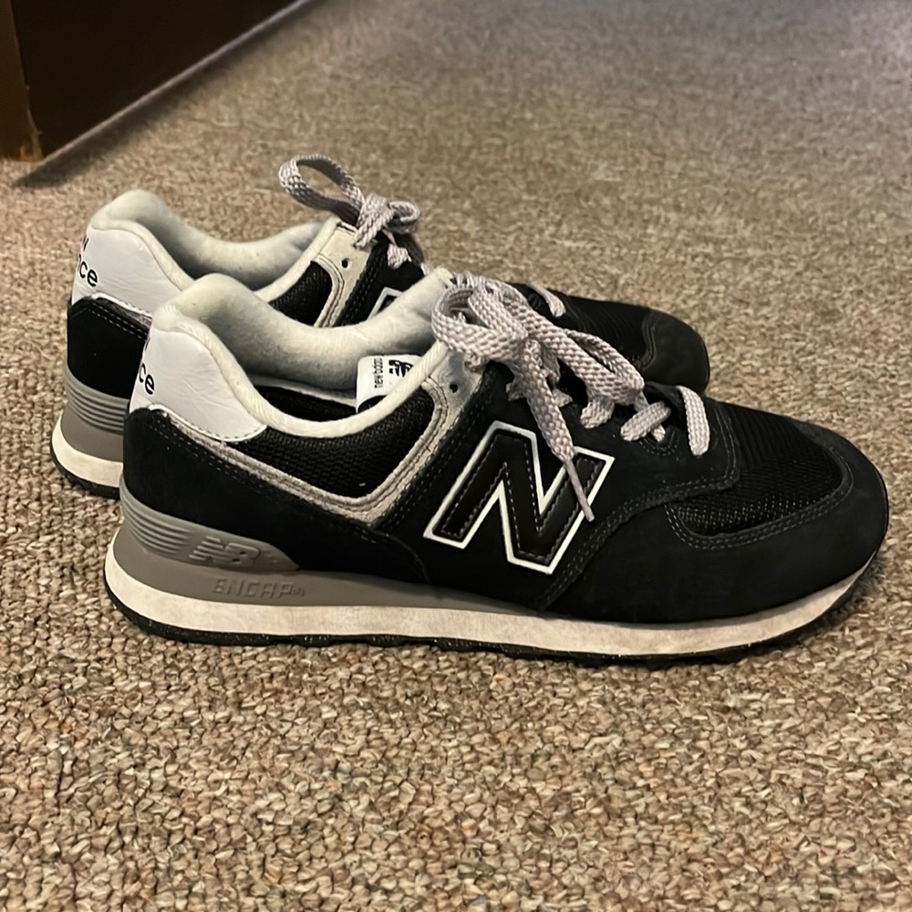 Used black New Balance 574